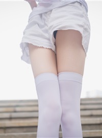 Rabbit plays with painted white stockings over the knee(9)